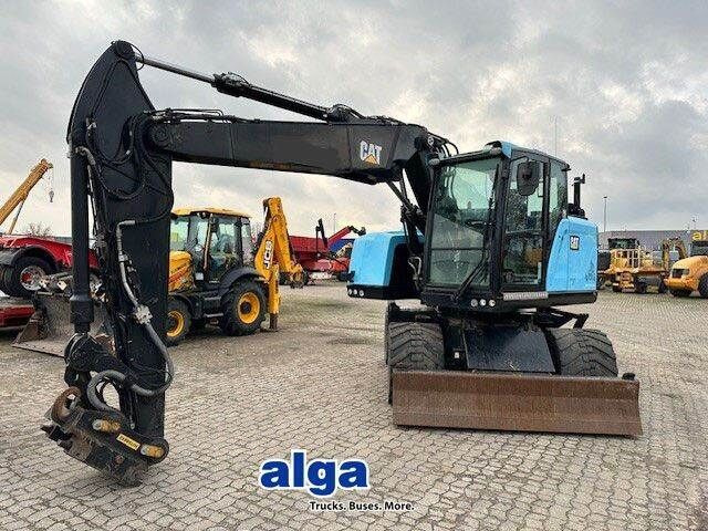 Caterpillar M315F, OilQuick, Hammer- u- Greifersteuerung - Grävmaskin på däck: bild 1 Caterpillar M315F, OilQuick, Hammer- u- Greifersteuerung - Grävmaskin på däck: bild 1