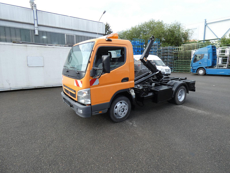 Mitsubishi Canter Fuso Abrollkipper - Flakbil, Kranbil: bild 1 Mitsubishi Canter Fuso Abrollkipper - Flakbil, Kranbil: bild 1