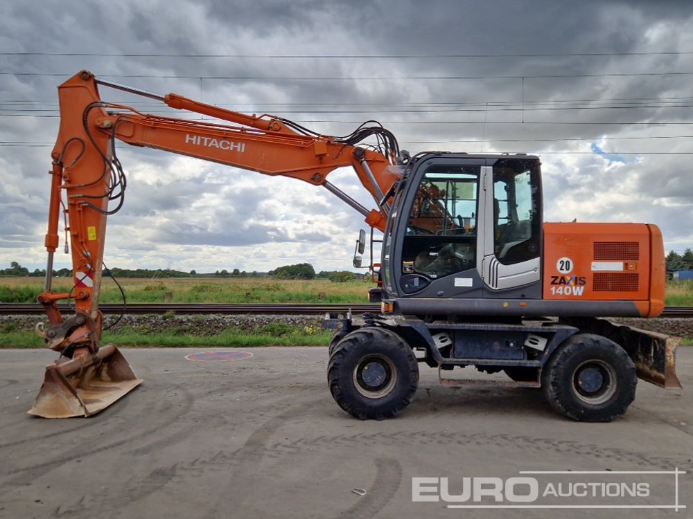 2010 Hitachi ZX140W-3 - Grävmaskin på däck: bild 2 2010 Hitachi ZX140W-3 - Grävmaskin på däck: bild 2