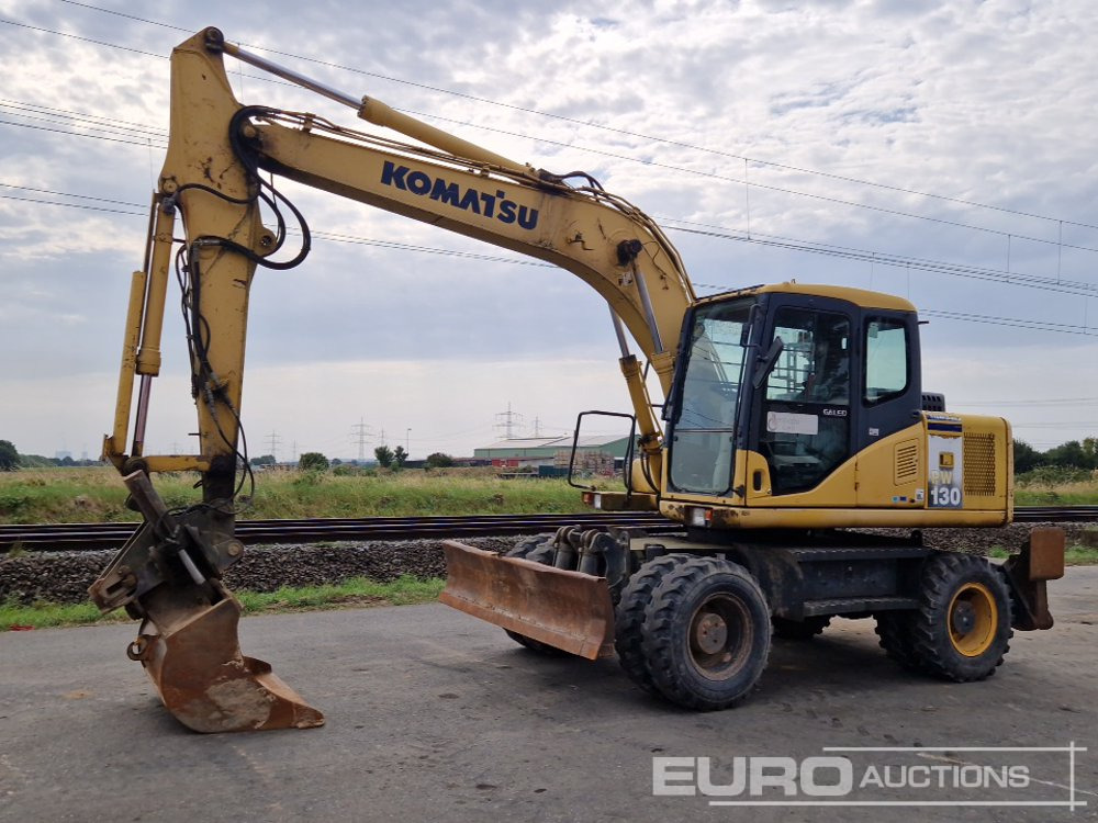 Komatsu PW130-7K - Grävmaskin på däck: bild 1 Komatsu PW130-7K - Grävmaskin på däck: bild 1