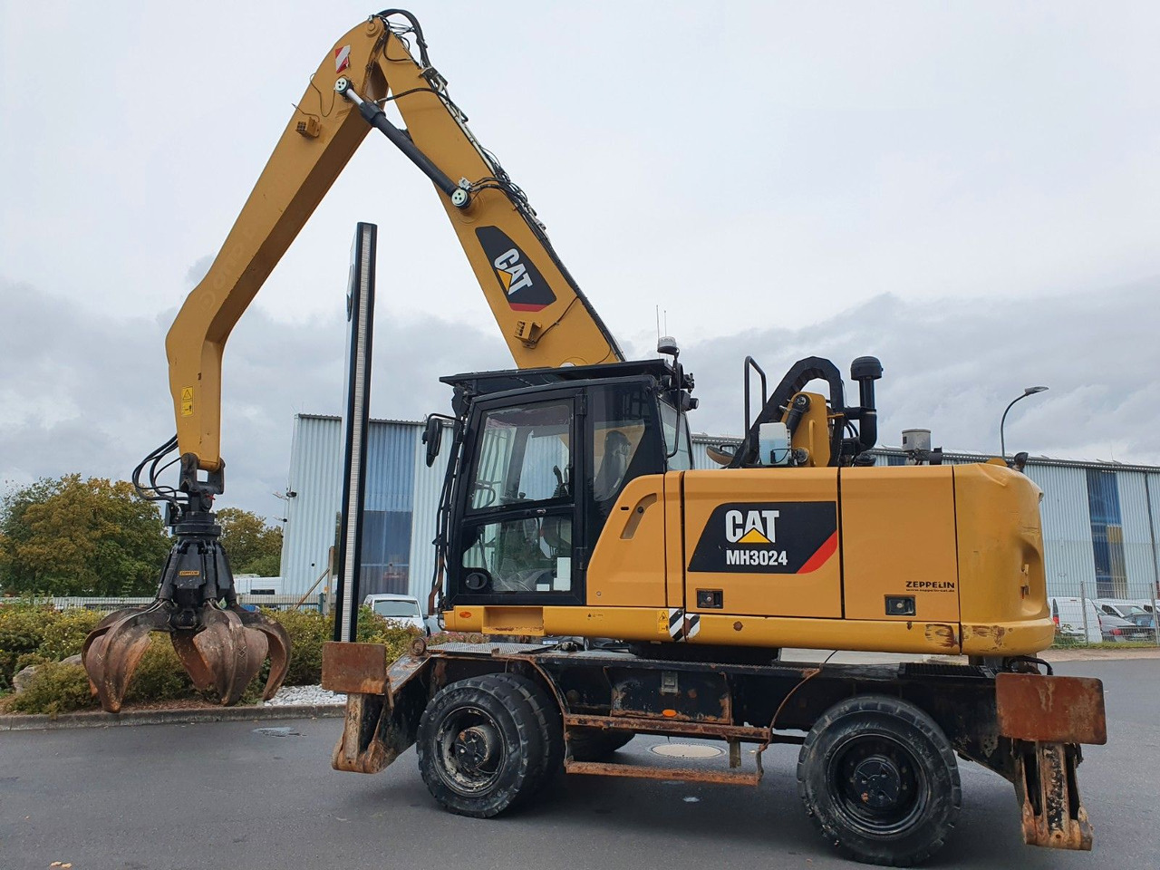 CAT MH3024 / MH 3024 / Greifer / 2018 / 9.424h - Grävmaskin på däck: bild 4 CAT MH3024 / MH 3024 / Greifer / 2018 / 9.424h - Grävmaskin på däck: bild 4