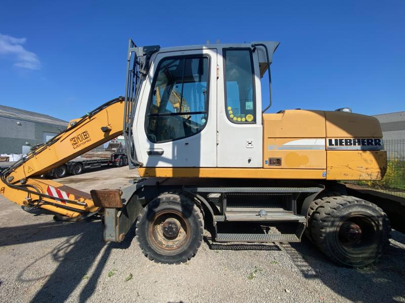 Liebherr A316Litronic - Grävmaskin på däck: bild 1 Liebherr A316Litronic - Grävmaskin på däck: bild 1