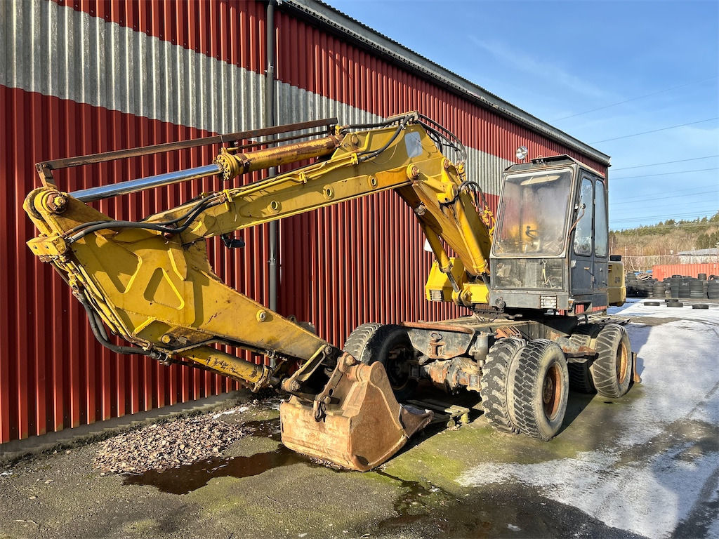 John Deere JD44 - Grävmaskin på däck: bild 1 John Deere JD44 - Grävmaskin på däck: bild 1