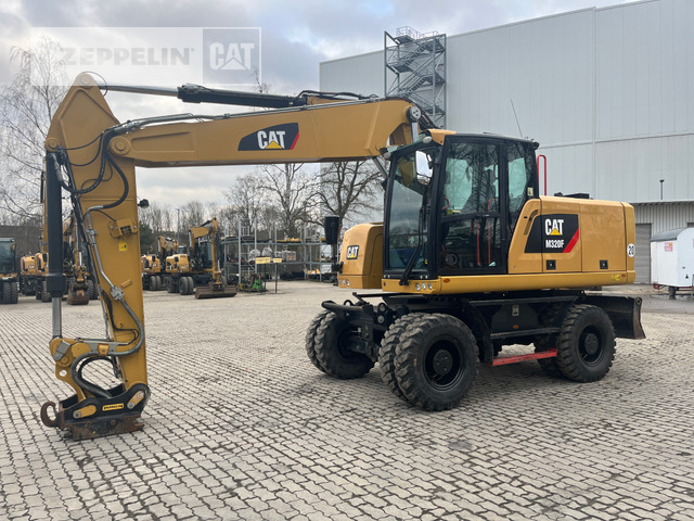 Cat M320F - Grävmaskin på däck: bild 1 Cat M320F - Grävmaskin på däck: bild 1